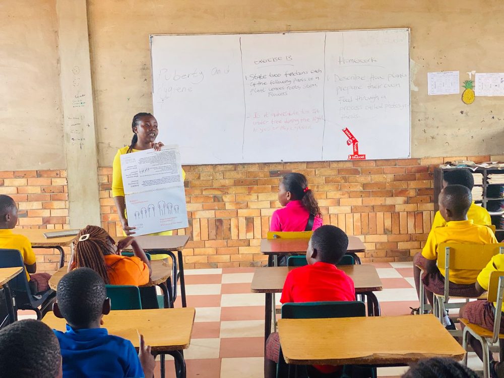 A teacher leading a puberty and hygiene lesson in Senase